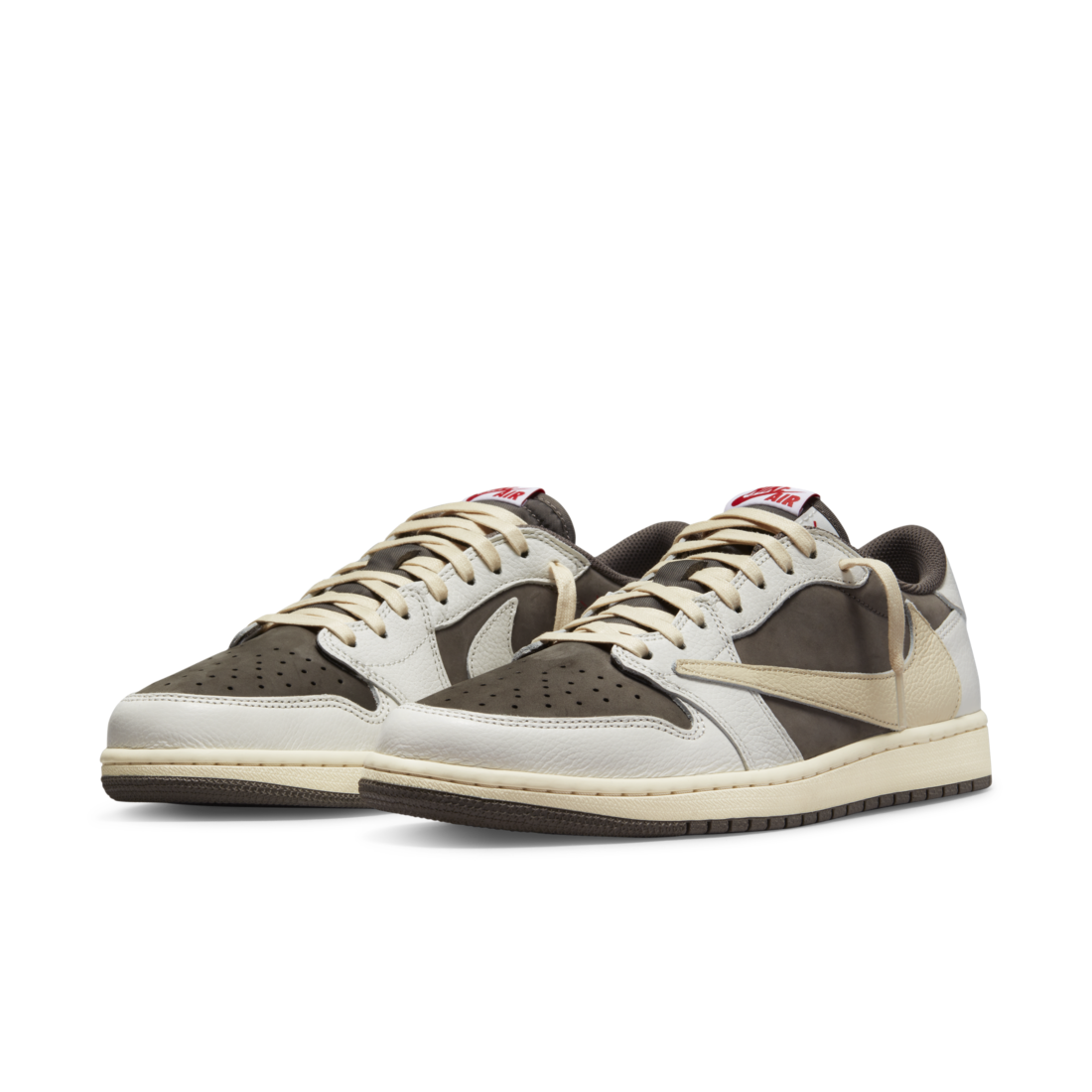 Pair of Travis Scott Air Jordan 1 Low Reverse Mocha shoes